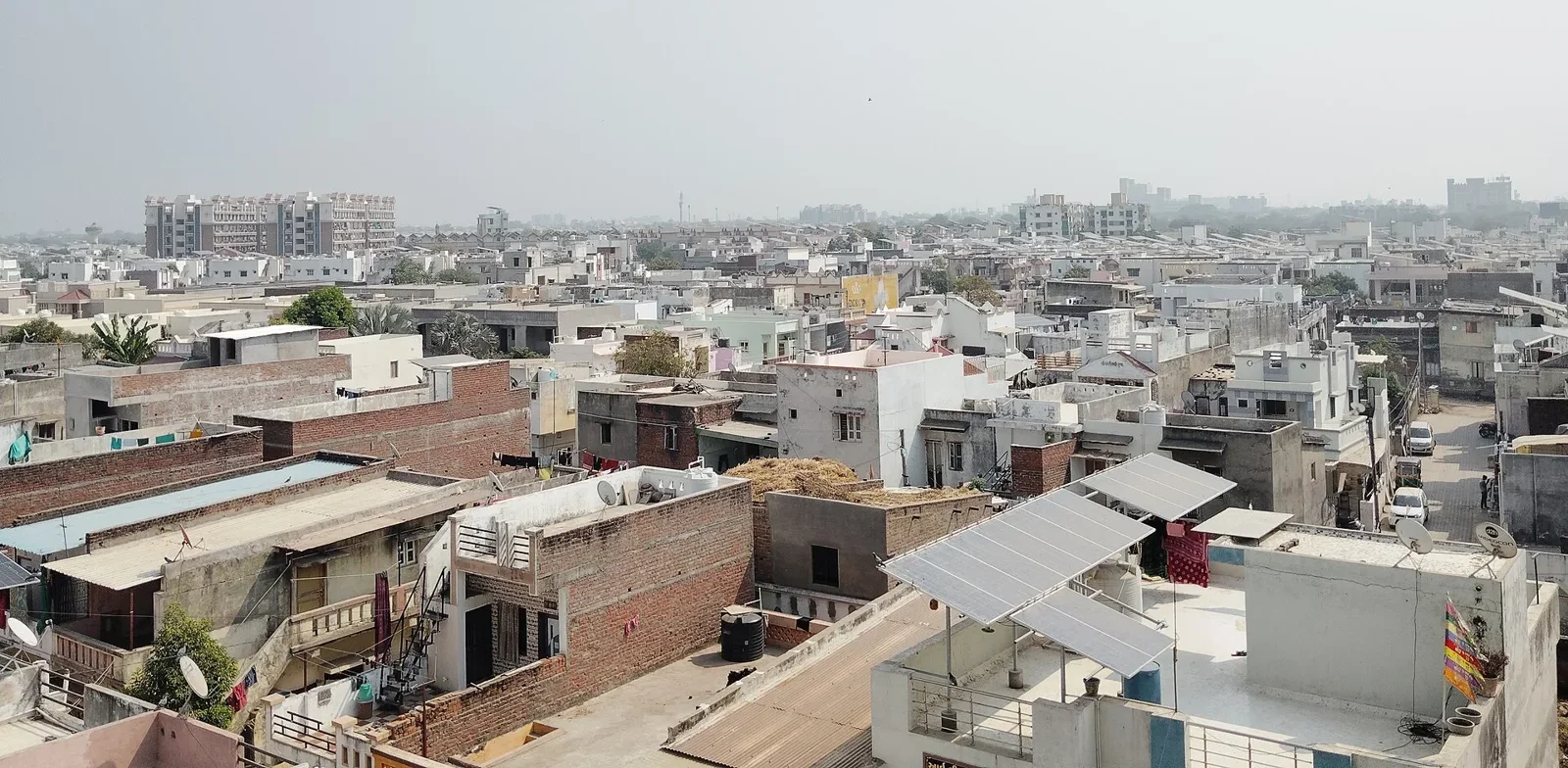 Solar panels on flat residential rooftops in Mehsana, Gujarat, India